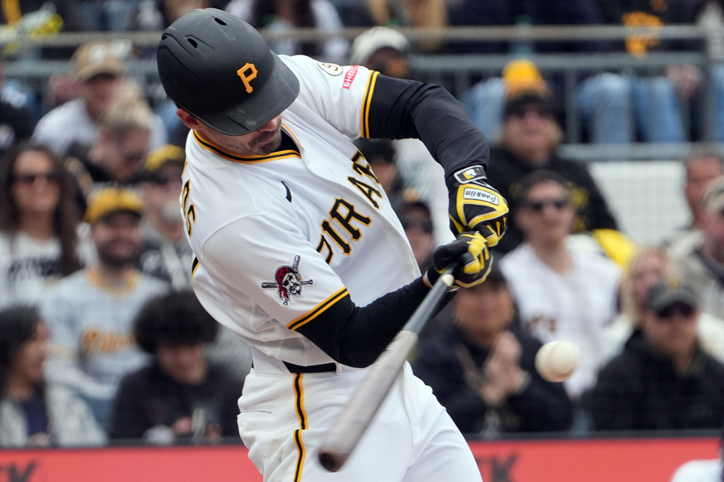 Pittsburgh Pirates' Bryan Reynolds singles off Tampa Bay Rays pitcher Shane McClanahan to drive in two runs in the fifth inning of a baseball game in Pittsburgh, Sunday, April 19, 2026. (AP Photo/Tom E. Puskar)