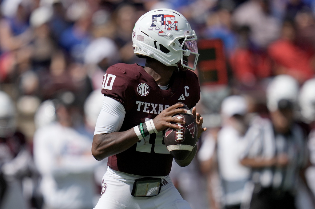 Texas A&M quarterback Marcel Reed (10) looks to pass downfield against Arizona State during the first quarter of an NCAA college football game Saturday, Sept. 12, 2026, in College Station, Texas. (AP Photo/Sam Craft)
