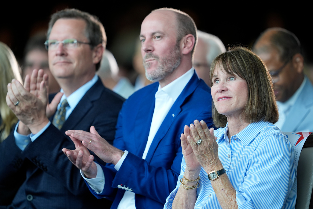Tennessee Titans controlling owner Amy Adams Strunk, right, and owner Kenneth Adams IV, center, attend a news conference Wednesday, May 20, 2026, announcing the 2030 Super Bowl being held at the Tennessee Titans football team's Nissan Stadium in Nashville, Tenn. (AP Photo/George Walker IV)