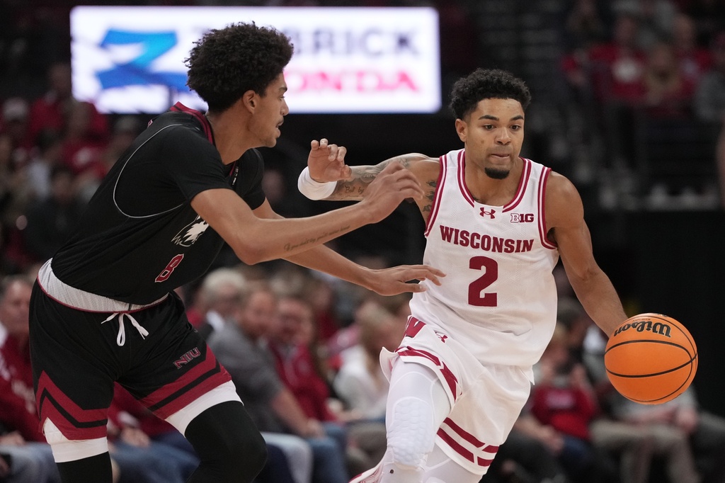 Wisconsin's Nick Boyd tries to get past Northern Illinois' Ladji Kante during the second half of an NCAA college basketball game Friday, Nov. 7, 2025, in Madison, Wis. (AP Photo/Morry Gash)