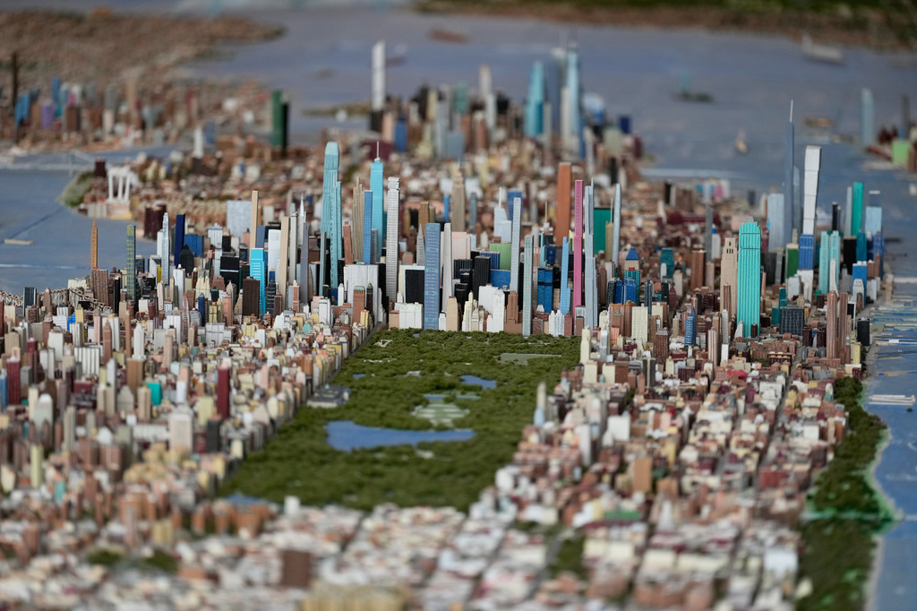 Central Park and the tall buildings of midtown Manhattan are seen on a large model of the New York City, made by Joe Macken, at the Museum of the City of New York in New York, Monday, Sept. 14, 2026. (AP Photo/Seth Wenig)
