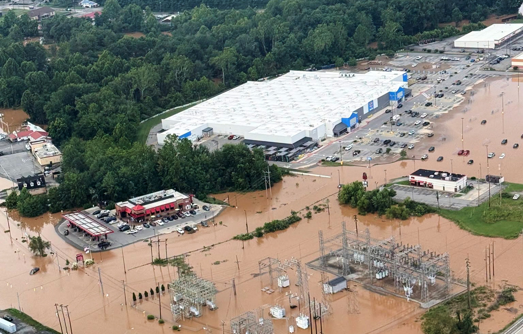 An Aerial view shows extensive flooding in Buckhannon, W.Va., Wednesday, July 22, 2026. (Office of West Virginia Gov. Patrick Morrisey via AP)