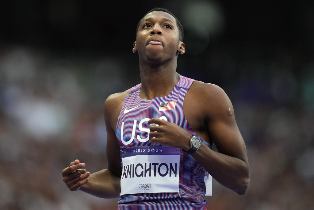FILE - Erriyon Knighton, of the United States, reacts following his men's 200-meter semifinal at the 2024 Summer Olympics, on Aug. 7, 2024, in Saint-Denis, France. (AP Photo/Petr David Josek, File)
