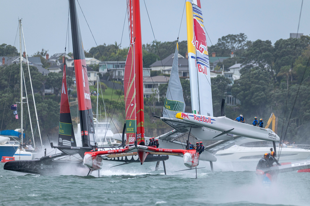 Red Bull Italy SailGP Team helmed by Phil Robertson, right, alongside Emirates Great Britain SailGP Team, center, and Rockwool Racing SailGP Team in action on race day 1 of the ITM New Zealand Sail Grand Prix in Auckland, New Zealand, Saturday Feb. 14, 2026. (Felix Diemer/SailGP via AP)