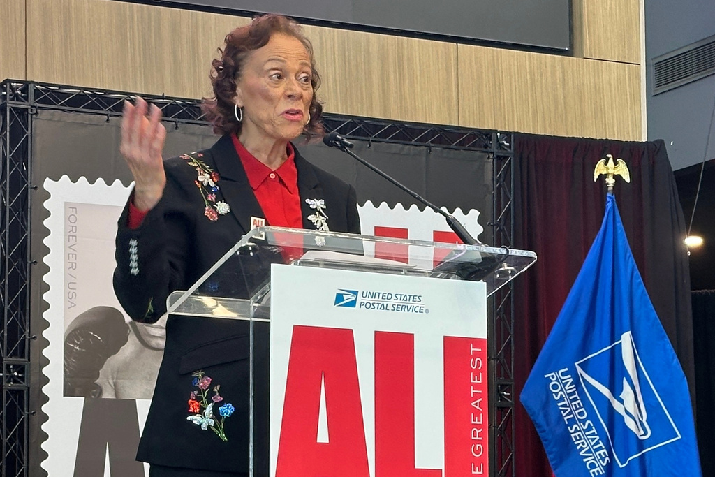 Lonnie Ali, widow of Muhammad Ali, speaks at an unveiling of a U.S. Postal Service commemorative stamp of the boxing legend in Louisville, Ky., on Thursday, Jan. 15, 2026. (AP Photo/Dylan Lovan)