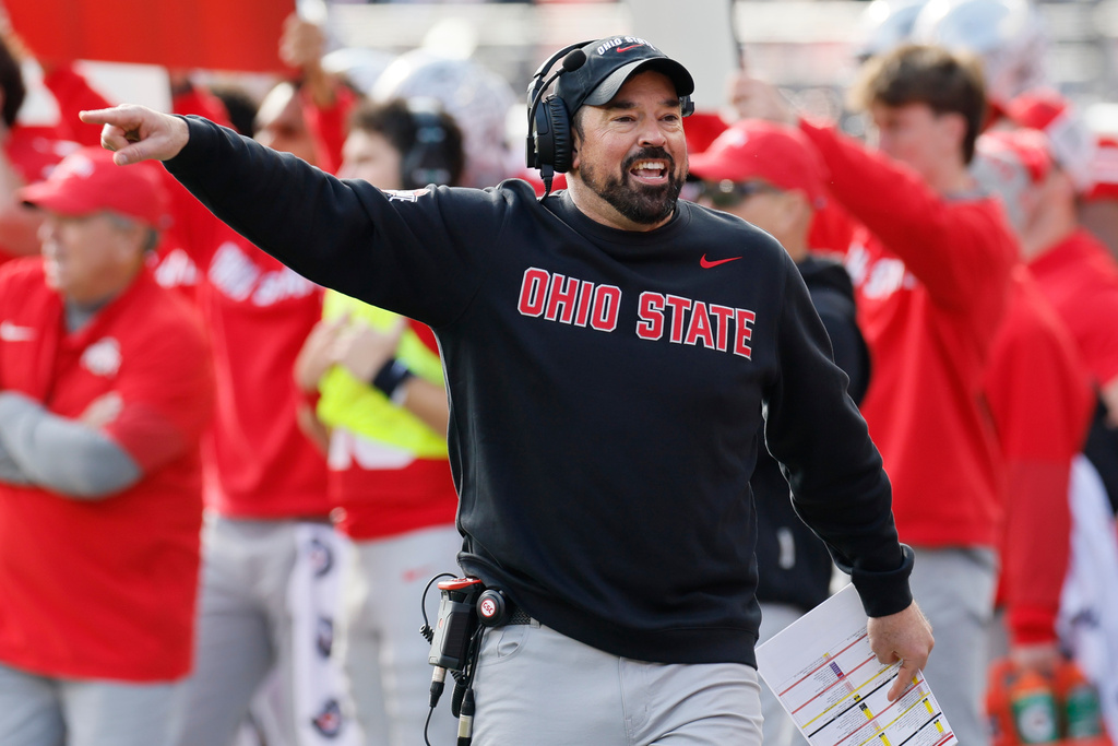 FILE - Ohio State head coach Ryan Day shouts to his team against Rutgers during the first half of an NCAA college football game, Nov. 22, 2025, in Columbus, Ohio. (AP Photo/Jay LaPrete, File)