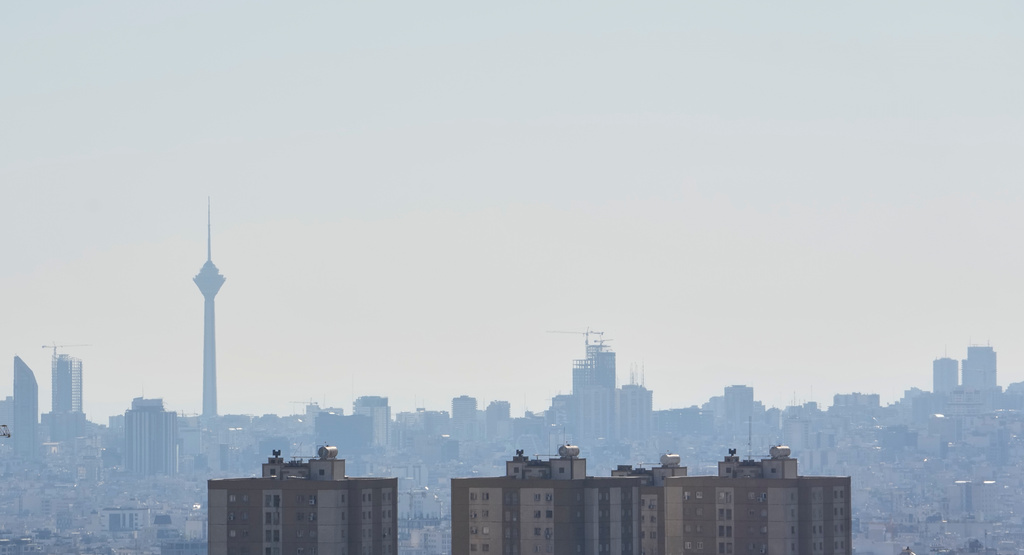 Milad telecommunication tower is seen at left in a general view of a part of Tehran, Iran, Thursday, April 23, 2026. (AP Photo/Vahid Salemi)