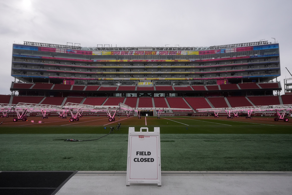Signs for Super Bowl LX are displayed on the SAP Tower at Levi's Stadium in Santa Clara, Calif., Tuesday, Jan. 20, 2026. (AP Photo/Jeff Chiu)