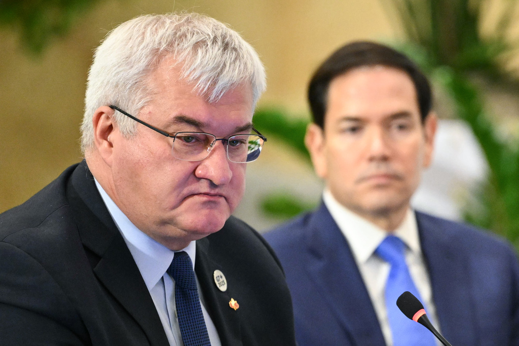 CORRECTS SPELLING TO SYBIHA NOT SYBIGA Ukraine's Foreign Minister Andriy Sybiha, left, and US Secretary of State Marco Rubio attend a G7 Session on Ukraine and Defense Cooperation during the G7 Foreign Ministers Meeting at the White Oaks Resort in Niagara-on-the-Lake, Canada, Wednesday, Nov. 12, 2025. (Mandel Ngan/Pool Photo via AP)
