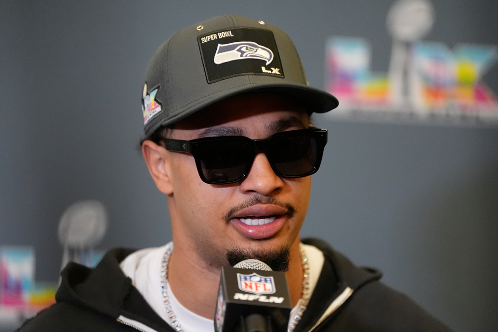 Seattle Seahawks wide receiver Jaxon Smith-Njigba speaks during a NFL Super Bowl news conference on Tuesday, Feb. 3, 2026, in San Jose, Calif., ahead of Super Bowl 60 between the New England Patriots and the Seattle Seahawks. (AP Photo/Brynn Anderson)