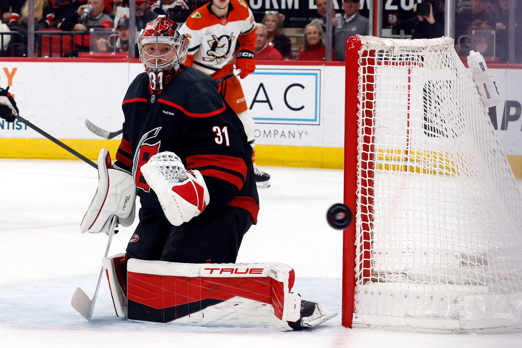 Carolina Hurricanes goaltender Frederik Andersen (31) watches the puck against the Anaheim Ducks during the first period of an NHL hockey game in Raleigh, N.C., Thursday, Jan. 8, 2026. (AP Photo/Karl DeBlaker)