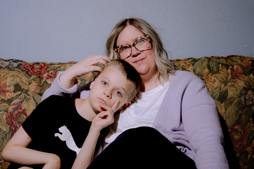 Lindsey Althaus and her son, Whitman Althaus, 12, who has autism and a neurological disorder called apraxia, pose for a portrait at their home Wednesday, July 1, 2026, in Luckey, Ohio. (AP Photo/Nic Antaya)