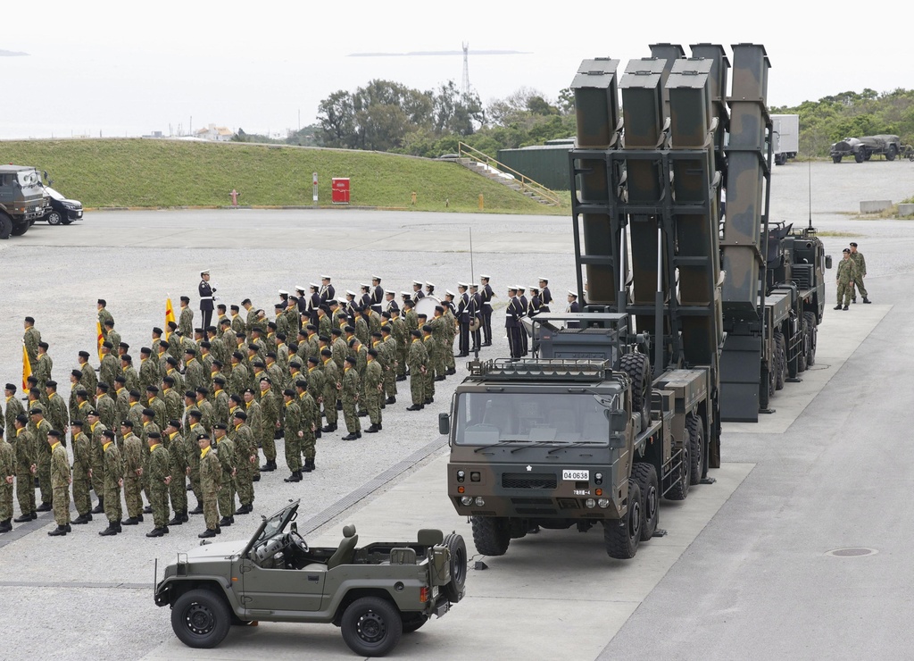 Type-12 surface-to-ship missile launchers are seen at the inauguration ceremony of a missile regiment of the Japan Ground Self-Defense Force in Uruma, Okinawa, southern Japan, on March 30, 2024. (Kyodo News via AP)