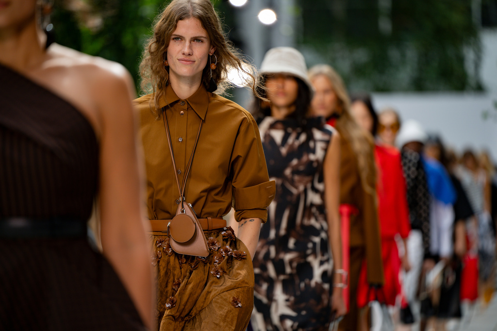 Models walk the runway during the Michael Kors Spring/Summer 2027 presentation as part of New York Fashion Week on Friday, Sept. 11, 2026, in New York. (AP Photo/Vincent Alban)