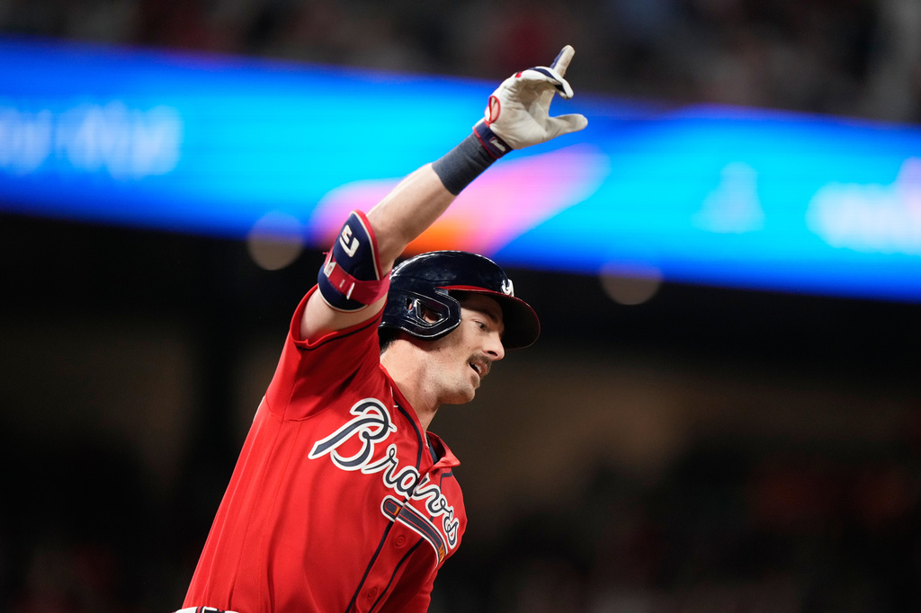 Atlanta Braves' Mike Yastrzemski (18) celebrates in the 10th inning of a baseball game against the Boston Red Sox Friday, May 15, 2026, in Atlanta. (AP Photo/Brynn Anderson)