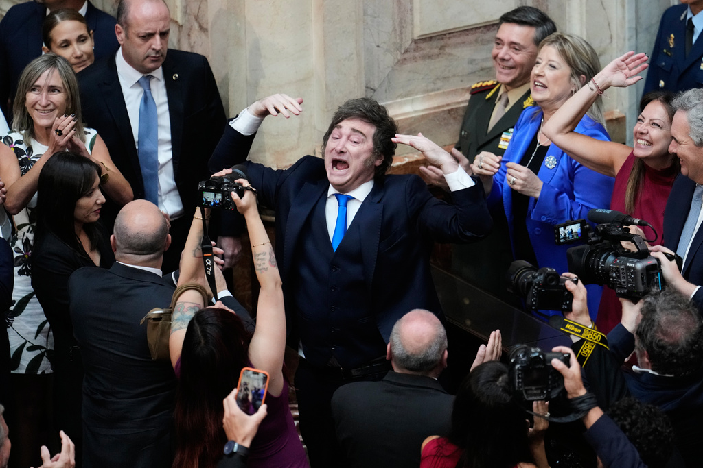 Argentina's President Javier Milei arrives at Congress to deliver the annual State of the Nation address in Buenos Aires, Argentina, Sunday, March 1, 2026. (AP Photo/Gustavo Garello)