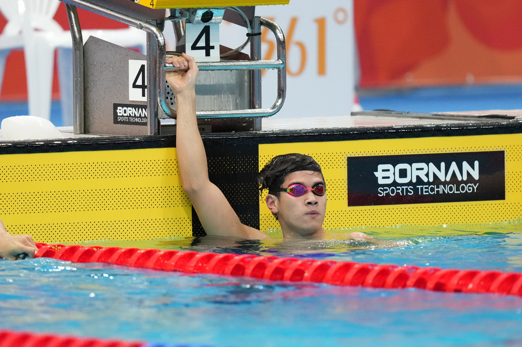 Pan Zhanle of China watches the scoreboard after competing in the men's 100-meter freestyle final in swimming at the Asian Games in Tokyo, Japan, Sunday, Sept. 20, 2026. (AP Photo/Hiro Komae)