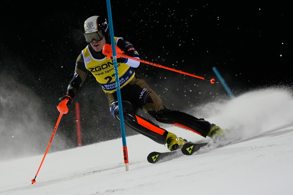 Finland's Eduard Hallberg speeds down the course during an alpine ski, men's World Cup slalom, in Madonna di Campiglio, Italy, Wednesday, Jan. 7, 2026. (AP Photo/Giovanni Auletta)