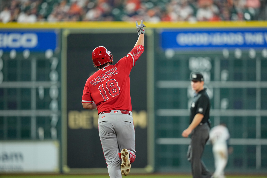 Los Angeles Angels' Nolan Schanuel celebrates after hitting a home run against the Houston Astros during the ninth inning of an opening-day baseball game Thursday, March 26, 2026, in Houston. (AP Photo/David J. Phillip)