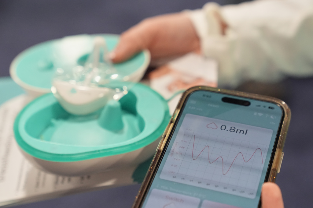A Coro breastfeeding monitor and application are pictured at a Coroflo booth during the CES Unveiled tech show Sunday, Jan. 4, 2026, in Las Vegas. (AP Photo/Abbie Parr)