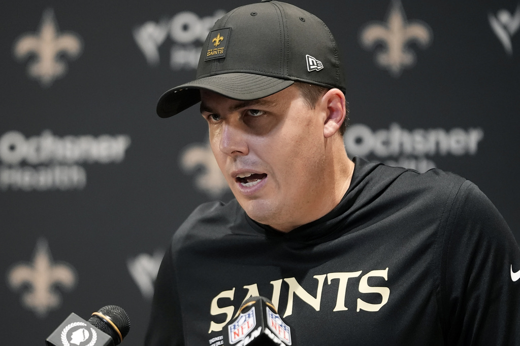 New Orleans Saints head coach Kellen Moore answers a question during a news conference after an NFL football game against the Arizona Cardinals Sunday, Sept. 7, 2025, in New Orleans. (AP Photo/Gerald Herbert)