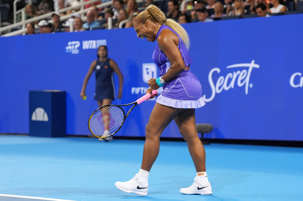 Serena Williams, of the United States, reacts to a winning point during a women's doubles match against Marta Kostyuk, of Ukraine, and Peyton Stearns, of the United States, at the Cincinnati Open tennis tournament, Monday, Aug. 17, 2026, in Mason, Ohio. (AP Photo/Kareem Elgazzar)