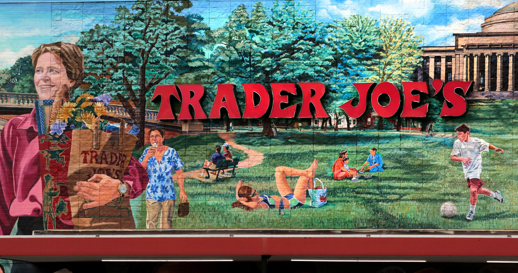 FILE - The Trader Joe's logo hangs on a mural, Aug. 13, 2019, in Cambridge, Mass. (AP Photo/Charles Krupa, File)