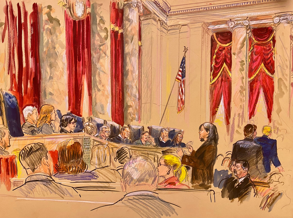 This courtroom sketch depicts Cecillia Wang, the American Civil Liberties Union legal director, standing center, making arguments before the U.S. Supreme Court, Wednesday, April 1, 2026 in Washington, as President Donald Trump, right, departs shortly after Wang began her presentation in defense of broad birthright citizenship. (Dana Verkouteren via AP)
