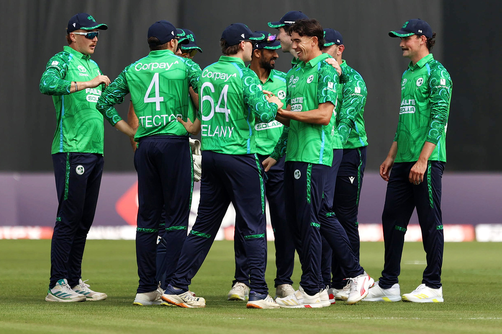 Ireland's Matt Hollard, center right, celebrates bowling out India's Ishan Kishan during the first T20I test match at Stormont, Belfast, Northern Ireland, Friday June 26, 2026. (Liam McBurney/PA via AP)