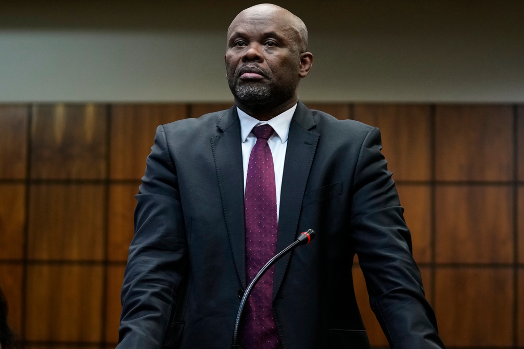 A suspended South Africa's Deputy National Police Commissioner for Crime Detection, Lt Gen Shadrack Sibiya, appears for his bail hearing at the Randburg Magistrate's Court, in Johannesburg, South Africa, Tuesday, Sept. 29, 2026. (AP Photo/Themba Hadebe)