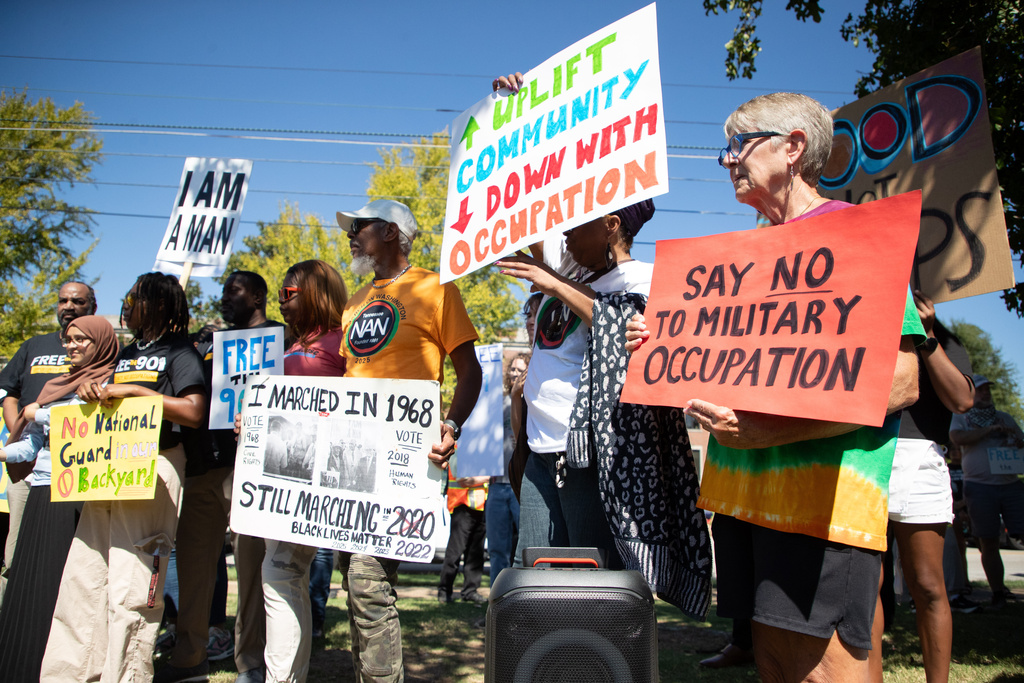 Protestors gather for a march in Memphis, Tenn., Saturday, Sept. 27, 2025, to protest against the deployment of National Guard troops to Memphis. (AP Photo/Nikki Boertman)