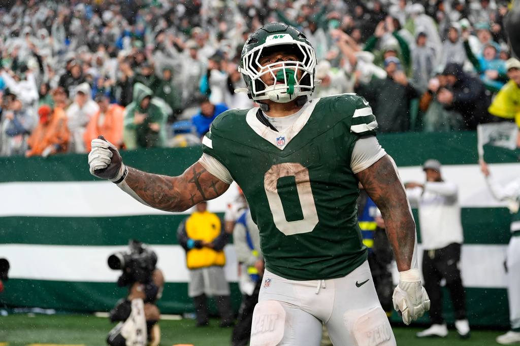 New York Jets running back Braelon Allen celebrates after a touchdown run during the second half of an NFL football game against the Cleveland Browns, Sunday, Oct. 11, 2026, in East Rutherford, N.J. (AP Photo/Seth Wenig)