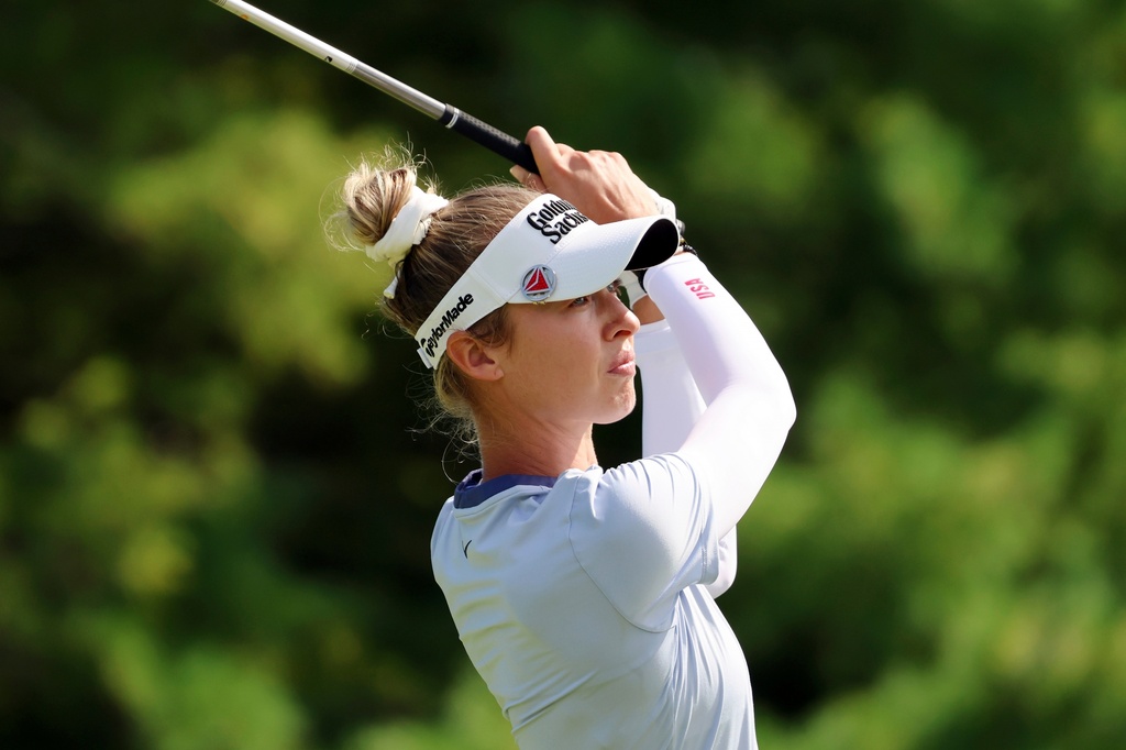 FILE - Nelly Korda hits from the third tee during the first round of the FM Championship LPGA golf tournament at TPC Boston, Thursday, Aug. 28, 2025, in Norton, Mass. (AP Photo/Michael Dwyer, File)