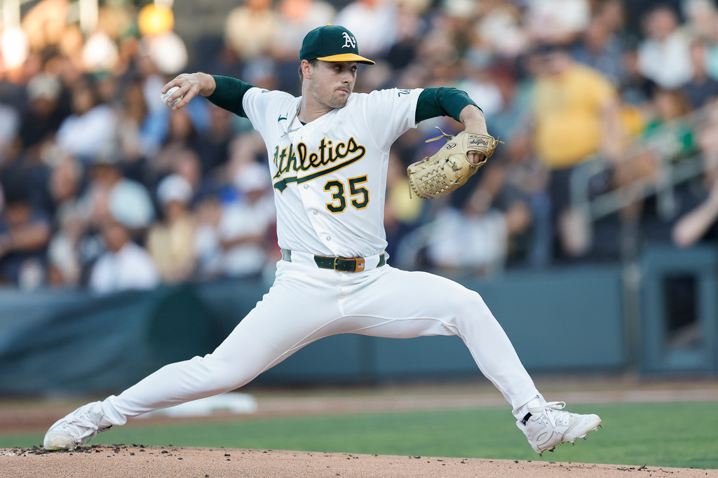 Athletics starting pitcher J.T. Ginn (35) throws during the first inning of a baseball game against the Milwaukee Brewers, Tuesday, June 9, 2026, in Las Vegas. (AP Photo/Caroline Brehman)