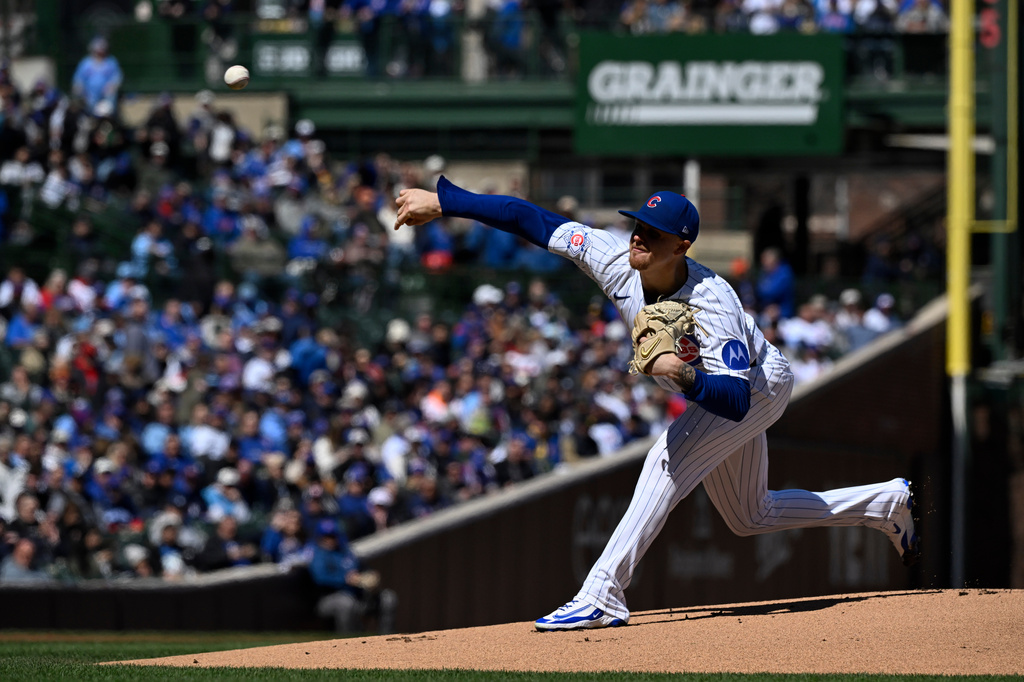 Chicago Cubs pitcher Cade Horton (22) delivers during the first inning of a baseball game against the Washington Nationals, Saturday, March 28, 2026, in Chicago. (AP Photo/Matt Marton)