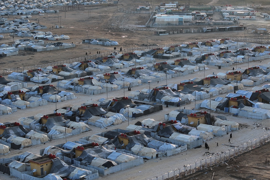 An aerial view shows the al-Hol camp in northeastern Syria's Hasakeh province, Syria, Wednesday, Jan. 21, 2026, after the withdrawal of the Syrian Democratic Forces (SDF). (AP Photo/Ghaith Alsayed)