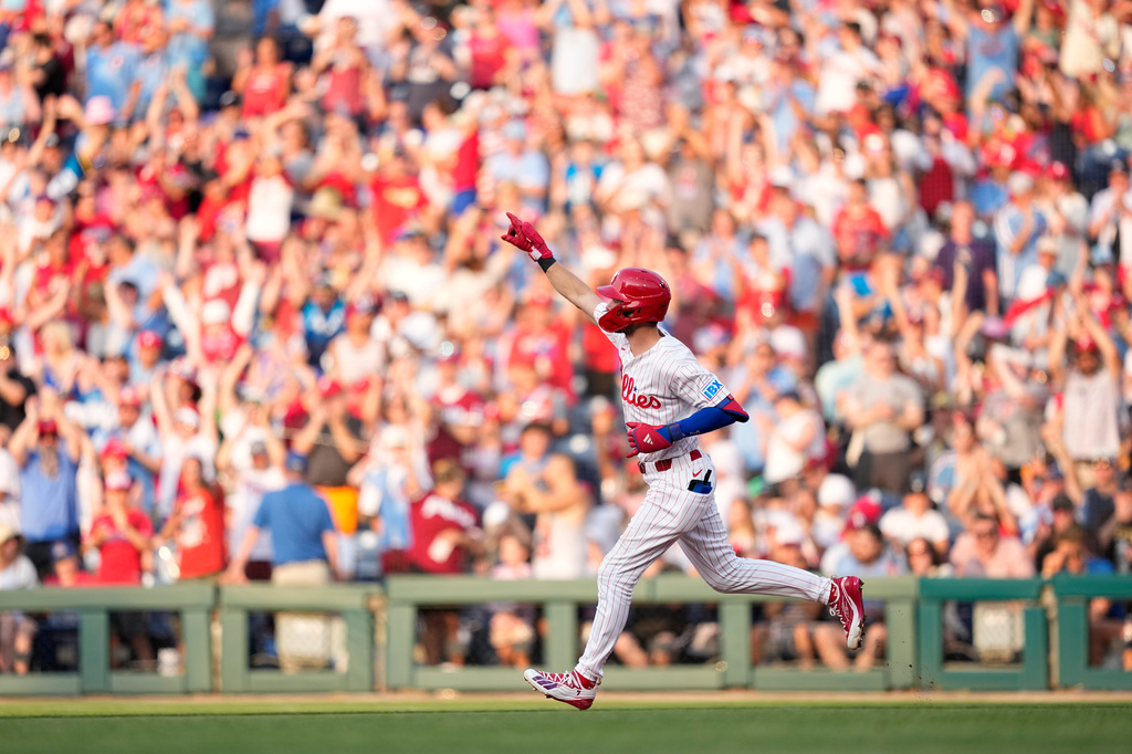 Philadelphia Phillies' Trea Turner reacts after hitting a three-run home run against Pittsburgh Pirates pitcher Paul Skenes during the second inning of a baseball game Wednesday, July 1, 2026, in Philadelphia. (AP Photo/Matt Slocum)