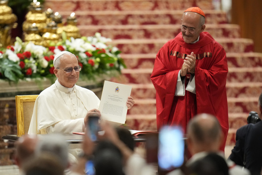 Pope Leo XIV, flanked by Cardinal Jose Tolentino de Mendonca, right, shows the apostolic letter on education before celebrating a Mass for the opening of the academic year of the Pontifical University and for the Jubilee of the Educational World in St. Peter's Basilica at the Vatican, Monday, Oct. 27, 2025.(AP Photo/Alessandra Tarantino) Pope Leo XIV, flanked by Cardinal Jose Tolentino de Mendonca, right, shows the apostolic letter on education before celebrating a Mass for the opening of the academic year of the Pontifical University and for the Jubilee of the Educational World in St. Peter's Basilica at the Vatican, Monday, Oct. 27, 2025.(AP Photo/Alessandra Tarantino)