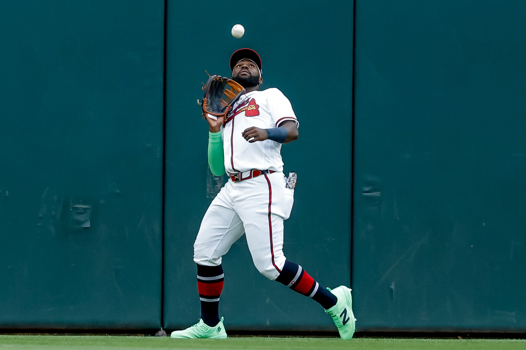 Atlanta Braves center fielder Michael Harris II (23) catches a fly ball hit by Detroit Tigers' Kevin McGonigle (7) during the first inning of a baseball game, Tuesday, April 28, 2026, in Atlanta. (AP Photo/Erik S. Lesser)
