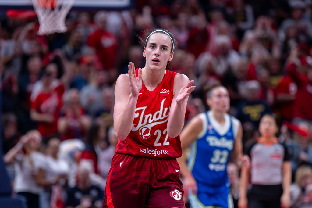 Indiana Fever guard Caitlin Clark (22) reacts during the second half of an WNBA basketball game against the Dallas Wings in Indianapolis, Saturday, May 9, 2026. (AP Photo/Doug McSchooler)
