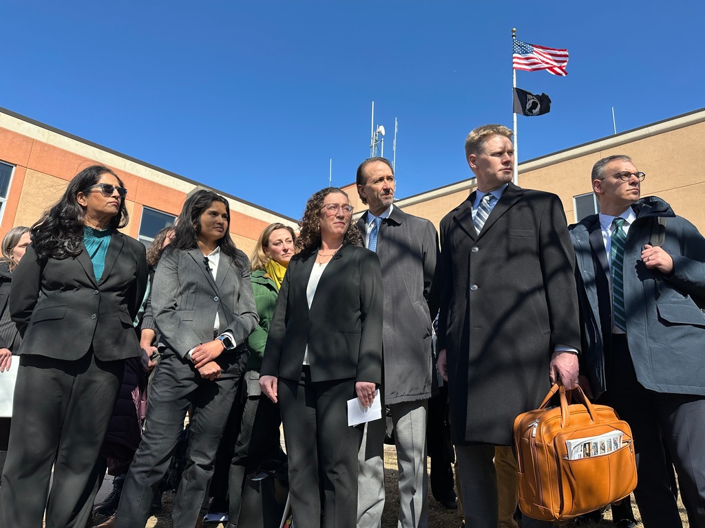 Leaders and attorneys for several Greenpeace entities listen to a reporter's question after a jury's verdict at the Morton County Courthouse in Mandan, N.D., Wednesday, March 19, 2025. (AP Photo/Jack Dura)