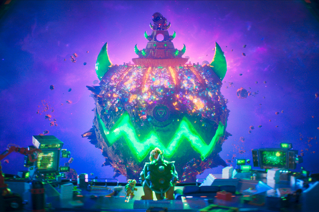 This image released by Universal Pictures shows characters Bowser Junior, voiced by Benny Safdie, center left, and Bowser, voiced by Jack Black, in a scene from "The Super Mario Galaxy Movie." (Nintendo and Illumination/Universal Pictures via AP)