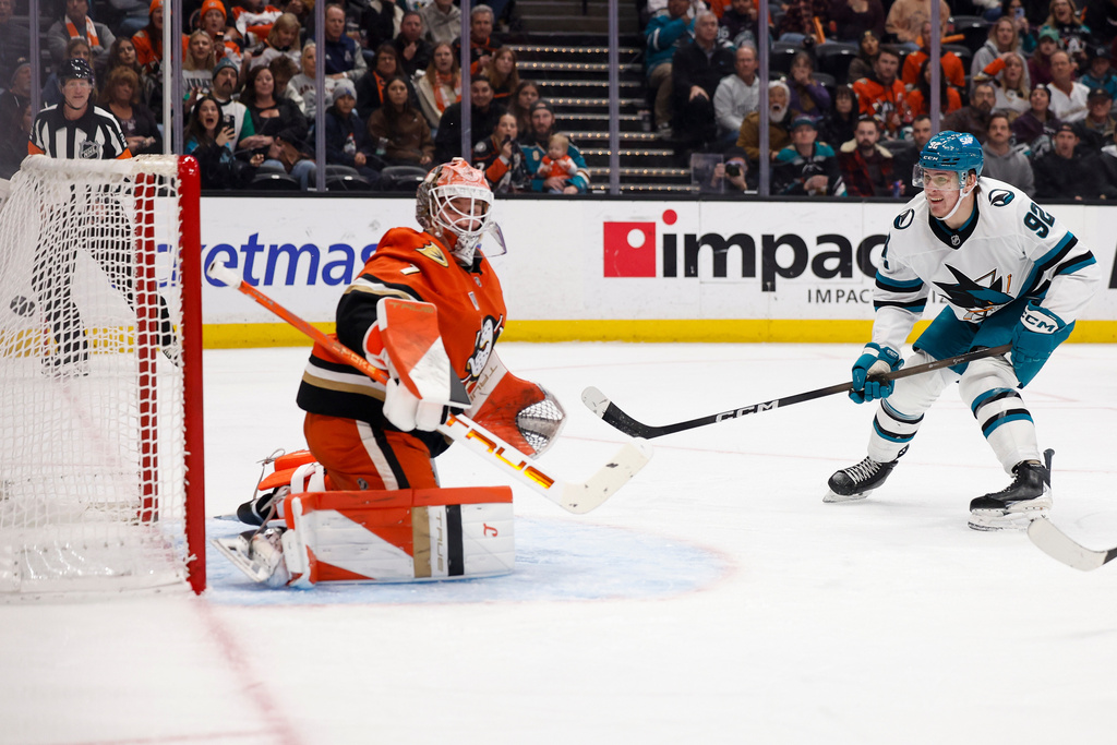 San Jose Sharks left wing Igor Chernyshov (92) scores against Anaheim Ducks goaltender Lukas Dostal (1) during the second period of an NHL hockey game Monday, Dec. 29, 2025, in Anaheim, Calif. (AP Photo/Caroline Brehman)