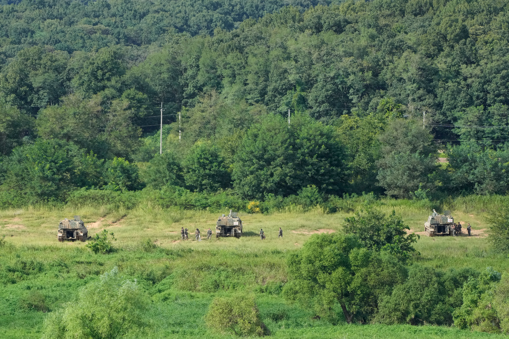 South Korean army K-9 self-propelled howitzers take positions in Paju, South Korea, near the border with North Korea, Sunday, Sept. 6, 2026. (AP Photo/Ahn Young-joon)