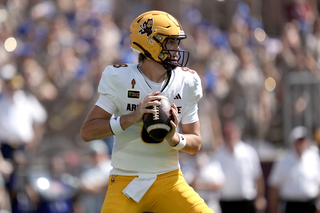 Arizona State quarterback Cutter Boley (8) looks to pass downfield against Texas A&M during the first quarter of an NCAA college football game Saturday, Sept. 12, 2026, in College Station, Texas. (AP Photo/Sam Craft)