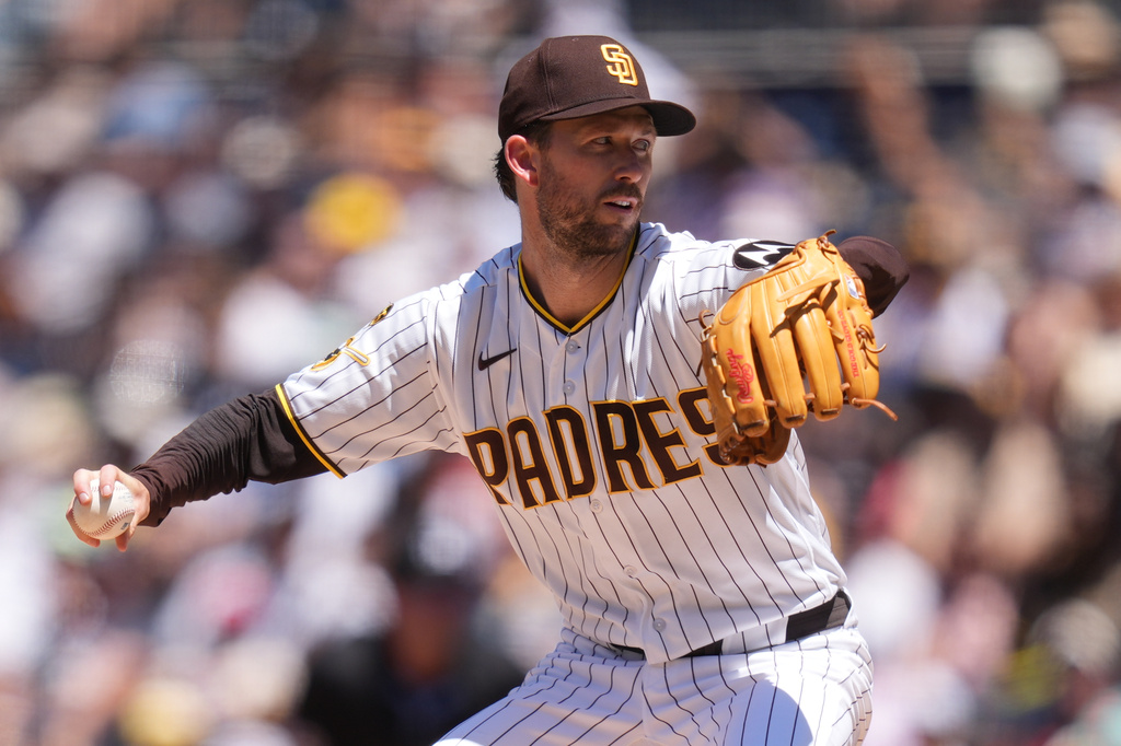 San Diego Padres pitcher Griffin Canning works against a Colorado Rockies batter during the third inning of a baseball game Wednesday, July 29, 2026, in San Diego. (AP Photo/Gregory Bull)