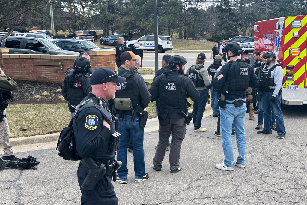 Law enforcement respond to a call at Temple Israel synagogue on Thursday, March 12, 2026, in West Bloomfield Township, Mich. (AP Photo/Corey Williams)
