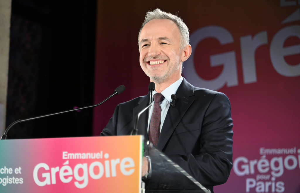 French socialist candidate for Paris mayoral election Emmanuel Gregoire smiles as he makes a statement after polls closed after the first round of France's municipal elections in Paris, Sunday March 15, 2026. (AP Photo/Emma da Silva)