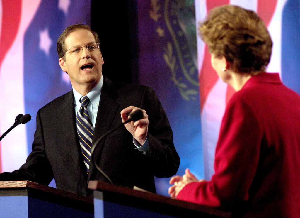 FILE - U.S. Sen. John Sununu, R-N.H., left, spars with Democratic rival and former governor Jeanne Shaheen during a live televised debate in Manchester, N.H., Oct. 30, 2008. (AP Photo/POOL/David Lane, File)