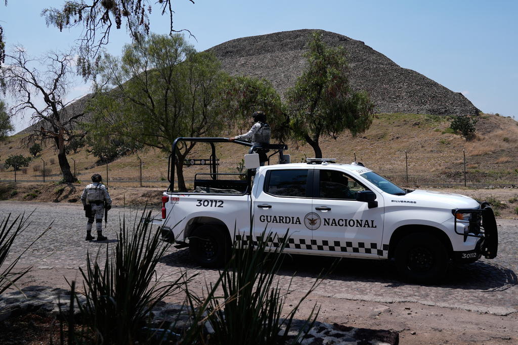 National Guard troops patrol the Teotihuacan pyramids, which remained closed a day after a gunman opened fire on tourists at the archaeological site outside Mexico City, Tuesday, April 21, 2026. (AP Photo/Marco Ugarte)